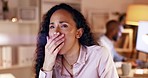 Tired, bored and a woman yawning at work during night shift, overtime and trying to meet a deadline. Burnout, overworked and an employee with a yawn, fatigue and stress while working late in office