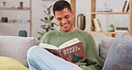 Happy, man and reading a book about plants for learning, knowledge and education on care. Smile, relax and a guy enjoying studying about caring for a plant, interesting facts and tips at home