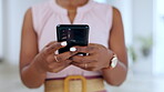 Business woman, hands and phone texting for social media, communication or browsing at the office. Closeup of female employee hand chatting, typing or research on mobile smartphone app at workplace