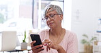 Healthcare, pill and phone research with a woman in her office, reading information about her medication. Medical, technology and tablet with a senior doing an online search for chronic treatment