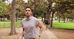 Man breathing, running and outdoor park with athlete profile doing fitness, workout and training. Nature trail, wellness and exercise of a male runner doing sports cardio for health and run goals