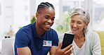 Phone, medical and a nurse talking to a patient in an assisted living facility for senior people. Healthcare, mobile and contact with a black man medicine professional chatting to a mature woman