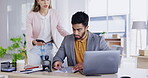 Laptop, phone and review with business people in the office, working together in discussion of a text message. Collaboration, communication or feedback with a man and woman employee talking at work