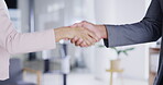 Partnership, collaboration and handshake in office for business deal, agreement or introduction. Man, woman and shaking hands for congratulations, opportunity or b2b, hiring and welcome to company.