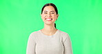 Green screen, face and woman with smile, happiness and confidence on color background, backdrop and chroma key. Portrait of happy female model with pride, good mood and carefree personality in studio