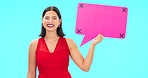 Social media, studio or happy woman with mockup speech bubble for opinion, info or advertising. Product placement portrait, Valentines Day announcement or female with voice mock up on blue background