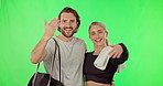 Invite, fitness and join  the gym on green screen with a couple ready to welcome a new member in studio. Portrait, motivation or hand gesture with a man and woman together on chromakey for exercise
