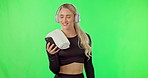 Woman, exercise and headphones with phone on green screen for music, dancing and happiness. Happy athlete person on smartphone for fitness workout, dance and listening to audio on mockup website