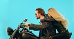 Travel, blue background and couple on motorcycle for speed on adventure, road trip and holiday mockup. Motorbike, transport and man and woman ride together for weekend, vacation and trip in studio