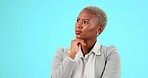 Thinking, confused and black woman in studio with decision, choice and pensive on blue background. Doubt, worry and lady employee with questions, deciding or contemplating emoji while posing isolated