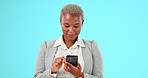 Typing, phone and black woman on blue background for chat on social media, internet and mobile app in studio. Communication, connection and girl on smartphone for chatting, text message and internet
