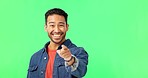 Man, come here hands and face by green screen with invite, excited and call by background. Young male student, welcome and pointing in portrait with mockup invitation for happiness by studio backdrop