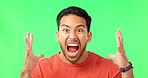 Shout, face and male in a studio with green screen with a yelling or angry face expression. Scream, angry and portrait of an annoyed Indian man model screaming isolated by a chroma key background.