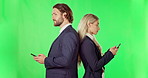 Phone, couple and standing on green screen with back in studio isolated on a background mockup. Cellphone, business and man and woman texting, social media or online browsing, web networking or think