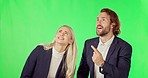 Pointing, looking and talking business people on a green screen isolated on a studio background. Happy, shock and a man and woman speaking about a surprise, mockup space and showing on a backdrop