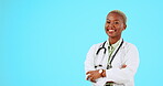 Proud black woman, portrait or doctor with smile or positive mindset in studio isolated on blue background. Copy space, face or happy African nurse smiling with arms crossed medical healthcare advice