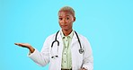 Doctor, safety or serious black woman in studio with mockup space for product placement on blue background. No, shaking head or African girl portrait in healthcare warning of risk to stop danger