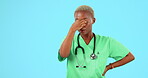 Stress, nurse and black woman with headache, pain or tired in studio isolated on a blue background mockup. Migraine, female medical professional and sick, fatigue or depression, brain fog and burnout