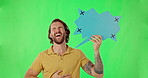 Speech bubble, social media and laughter with a man on a green screen background for humor or an announcement. Portrait, funny and a male person laughing while holding a poster with tracking markers