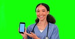 Phone, nurse and woman on green screen mockup in studio isolated on a background. Face portrait, cellphone and medical professional or happy person with product placement, space or tracking markers.