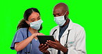 Tablet, teamwork and covid doctors on green screen in studio isolated on a background. Technology, face mask and medical collaboration of nurse and black man for telehealth, healthcare or research.