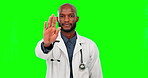 Doctor, black man and stop hands on green screen in studio isolated on a background mock up. Face portrait, medical professional and serious person in protest, rejection or warning, no or opinion.