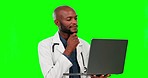 Laptop, thinking doctor and black man on green screen in studio isolated on a background mockup. Medical surgeon, computer and person with idea, telehealth solution or problem solving for healthcare.