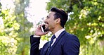 Business, phone call and smile with man in park for networking, social and conversation. Happy, technology and communication with male talking in outdoors for contact, discussion and negotiation