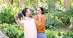 Love, selfie and couple showing ring, outdoor and happiness for relationship, marriage and romance. Romantic, man and woman with engagement, diamond and propose in park, social media and announcement