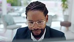 Business man, face and reading on computer for research, planning project and email in office. Black male employee working with glasses at desktop for data insight, website analysis or online network