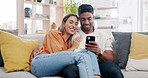 Couple, smartphone and relax on sofa with social network app, blog or video with communication in home. Man, woman and phone on couch with hug, conversation or reading with love, web chat or internet