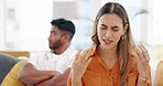 Angry woman talking to man in fight, problem and drama of divorce, cheating and mad at home. Couple in argument, bad relationship and frustrated partner speaking about emotions, betrayal and conflict