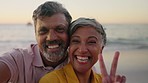 Senior couple, beach selfie and funny on sunset walk for romance, chat or profile picture for blog. Man, woman and photography by ocean for love, peace sign and social media app on retirement holiday