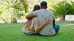 Back of couple, hug and love at park, grass and bonding for romantic date, quality time and summer. Man, woman and relax on lawn on garden for care, support and freedom together of views in nature