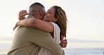 Love, beach hug and couple  by the sea with happiness and mockup on holiday trip for travel. Ocean, vacation date and happy people together with a loving and relax embrace with commitment outdoor