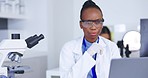 Black woman, scientist thinking with laptop and microscope, analysis of specimen with focus on science experiment. Medical research, female doctor review data on device and test sample in laboratory