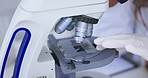 Scientist, microscope and analysis of slide sample with person in lab, medical research and science experiment. Doctor in laboratory, closeup and examining specimen with scientific innovation 