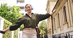 Happy, dance and woman in city, headphones and celebrate in street, cheerful and inspiration. Female person, person and girl with headset, dancing and movement in town, listening to music and radio