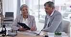 Business people, tablet and meeting for team strategy, collaboration or planning at the office. Businessman and woman discussing project plan, brainstorming or ideas on technology at the workplace