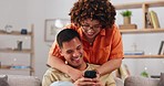 Love, social media and happy couple on sofa with phone, happiness and checking meme in apartment. Smile, man and woman on couch in living room, smartphone and quality time bonding together in home.