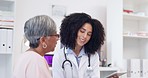 Senior woman, doctor and medical consulting in a hospital office with communication and results. Elderly patient, health worker and support from consultation service in a clinic with a tablet