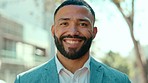 Business man, portrait and city with a male employee feeling confident and success outdoor. Urban businessman, happiness and smile of a young worker ready for work and management with job pride