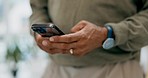 Closeup, hands and man with a cellphone, connection and chatting for social media. Male, person and guy with smartphone, mobile application and texting with technology, sms and online notification