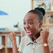 Computer, winner and celebration of business people in office for  achievement, goals or target. Winning, excited and happy black woman  celebrate with employee for success, promotion and good news. | Buy Stock