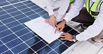 Blueprint, solar panels or hands of engineering people planning construction or photovoltaic roof. Closeup, renewable energy design or architecture team pointing or working on electricity project 