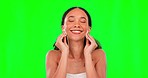 Beauty pads, cotton and woman on green screen for wellness, facial treatment and skincare. Dermatology, spa and face portrait of girl on chromakey with makeup removal, smile and natural cosmetics