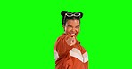 Woman, hand pointing and face with green screen and happiness with selection. Happy, isolated and studio background with a young female model with choice and emoji hands gesture with a smile