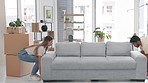 Happy couple moving sofa furniture in new home, real estate and property for relocation. Man, woman and relax on couch from interior decoration, apartment planning and investment of house ownership