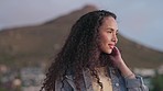 Woman, summer and mountain in evening, thinking and relax in sunset with peace, happiness and cityscape. Girl, outdoor adventure and enjoying dusk with calm wind, smile and freedom in Cape Town