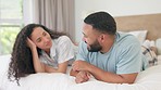 Bed, love and happy couple conversation, communication and morning discussion about romance, support and care. Happiness, love and home man, woman or people enjoy bonding time together in bedroom